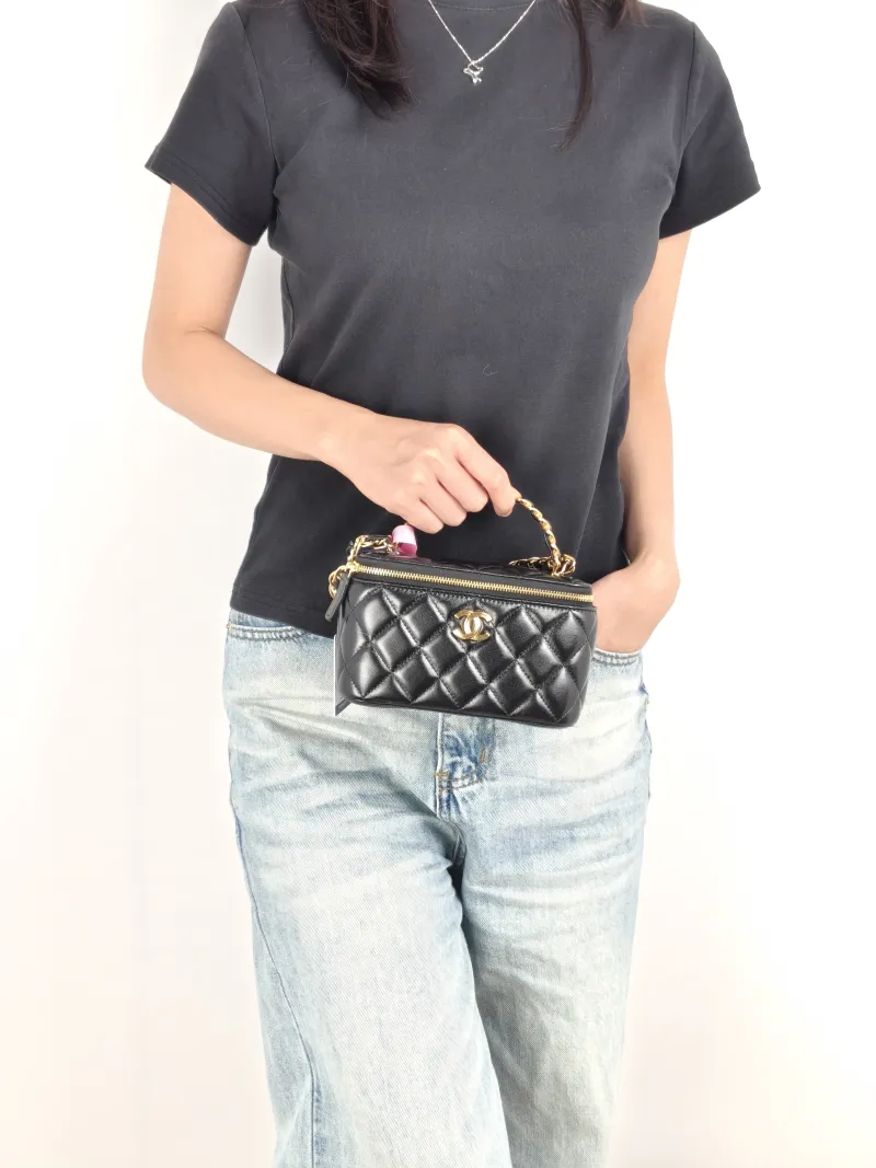 Chanel Crossbody Bag Edition Black Lambskinmini16 × 8 × 9.5 cm — on-model view 3 of 3