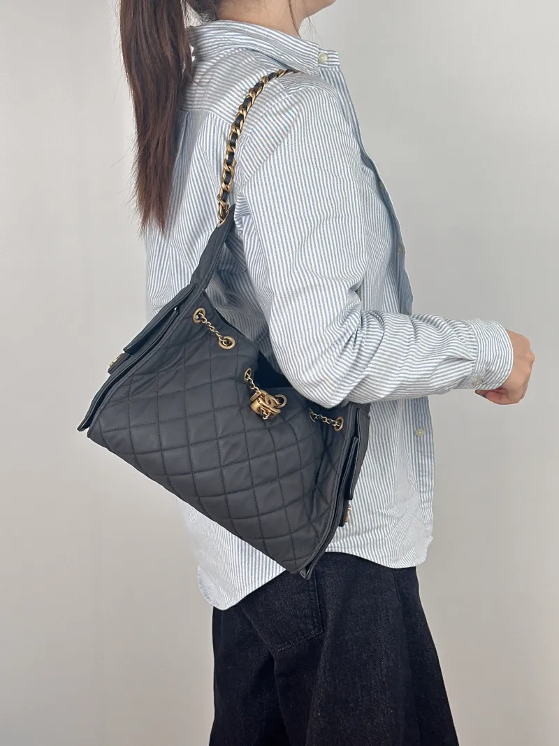 Chanel Shoulder Bag 25Bag Grey Canvas Small 26 × 14 × 30 cm — on-model view 2 of 2