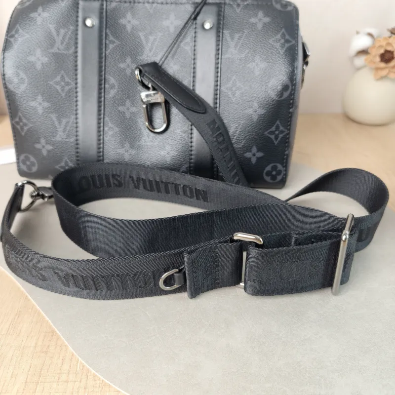 Louis Vuitton Crossbody Bag City Keepall Black PVC Medium 27 × 13 × 17 cm — detail view 8 of 11