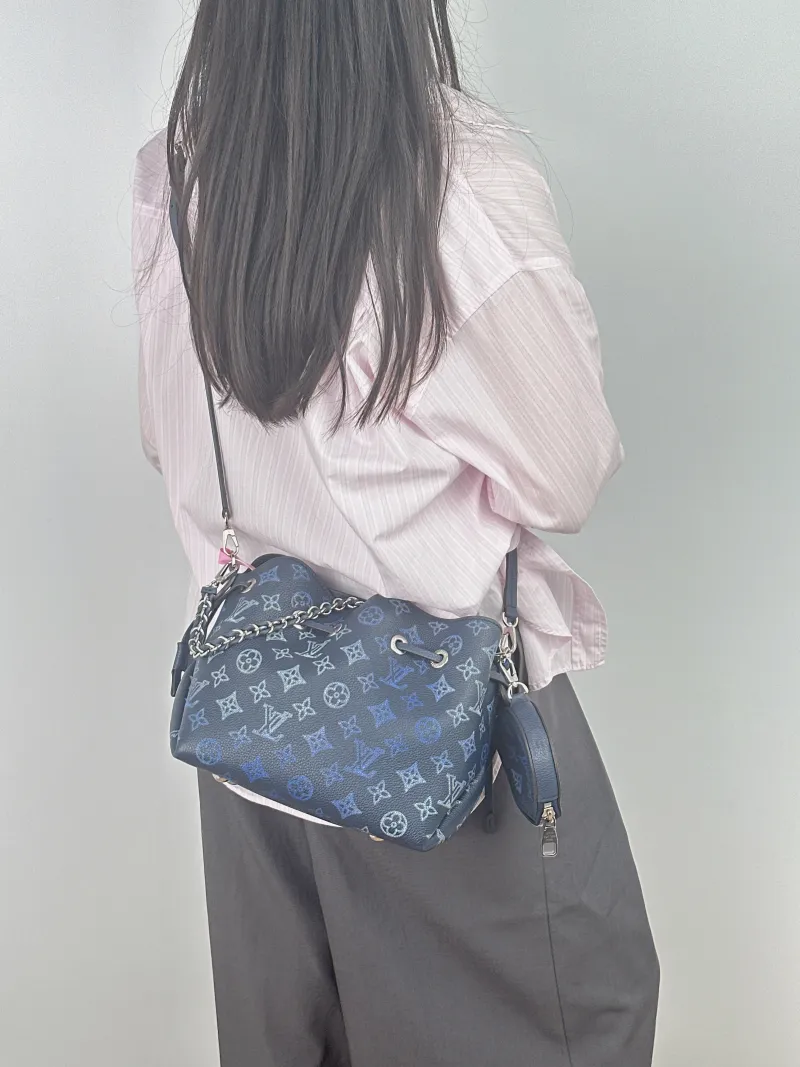 Louis Vuitton Crossbody Bag BELLA · Calfskin One Size 22 × 14 × 19 cm — on-model view 2 of 2