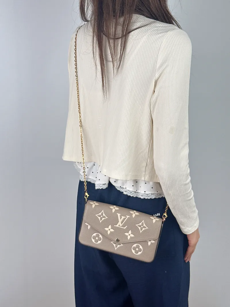 Louis Vuitton Crossbody Bag Pochette Félicie · White Calfskin Small 21 × 3 × 12 cm — on-model view 2 of 2