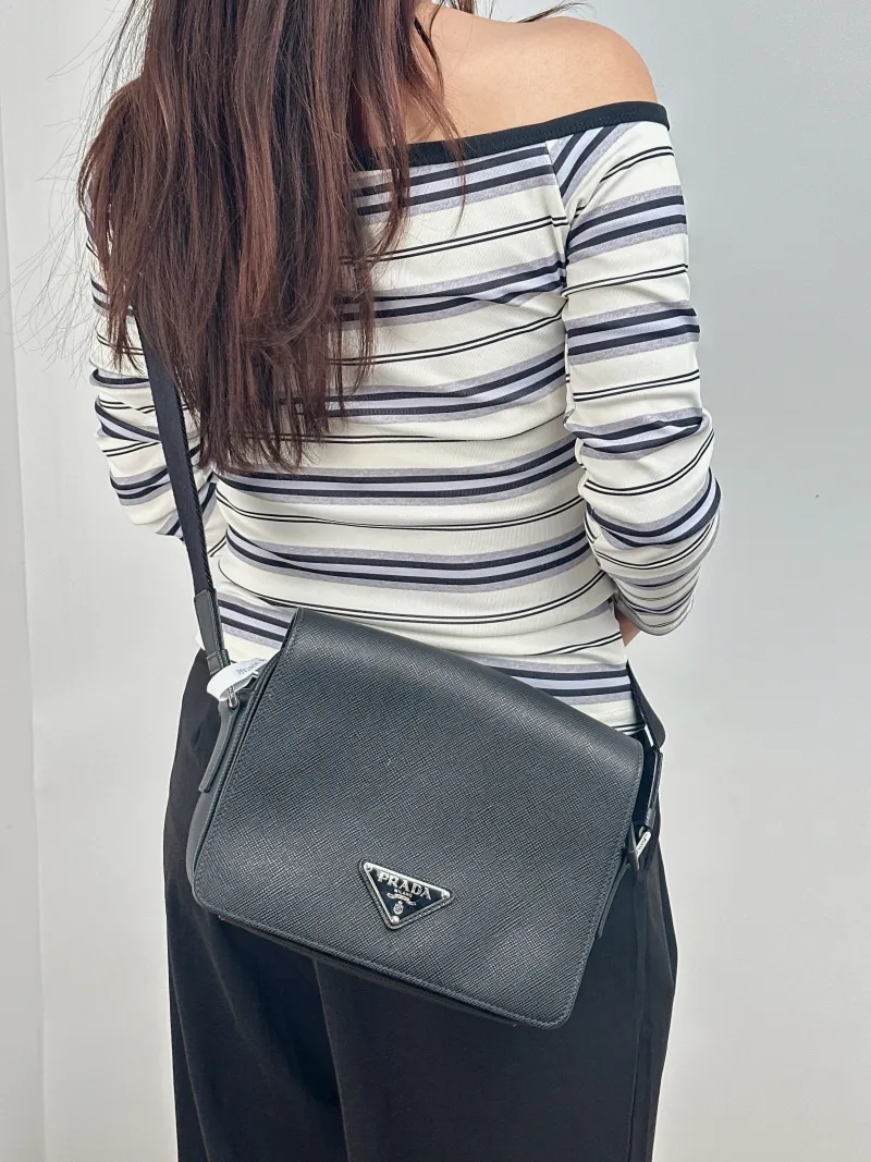 PRADA Shoulder Bag Soft Lux Messenger Bag Black Calfskin One Size 24 × 6 × 18 cm — on-model view 2 of 2