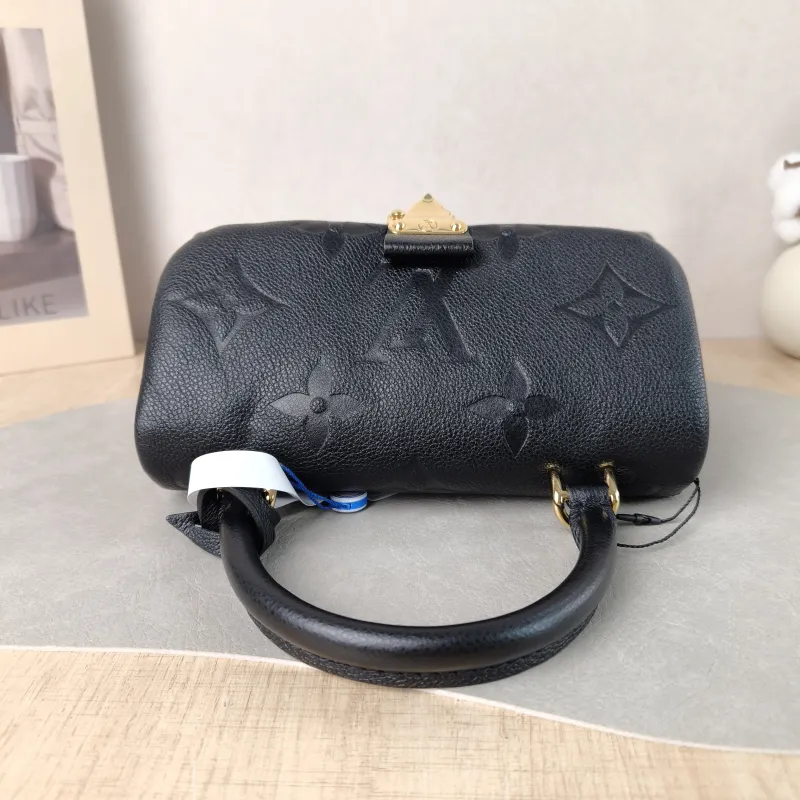 Louis Vuitton Crossbody Bag MADELEINE Black Empreinte Embossed Calfskin BB 24 × 8.5 × 17 cm — detail view 3 of 12