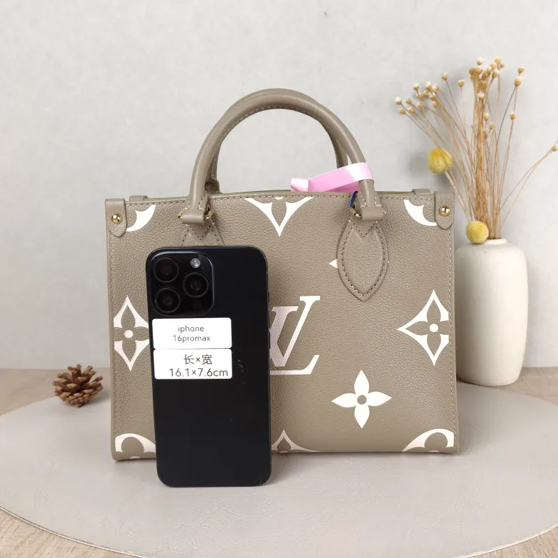 Louis Vuitton Top Handle Bag Onthego Monogram Empreinte Embossed Calfskin Small 25 × 11.5 × 19 cm — cover view 2 of 5