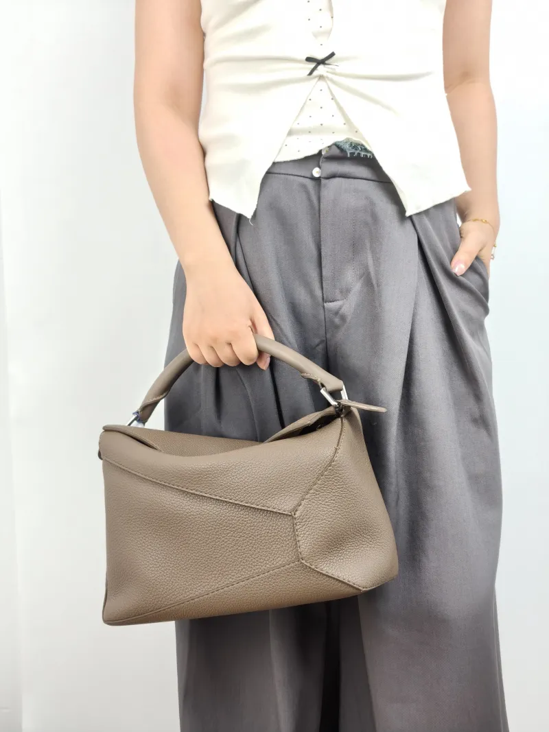 LOEWE Crossbody Bag Puzzle Brown Calfskin Medium 29 × 14 × 19.5 cm — on-model view 3 of 3