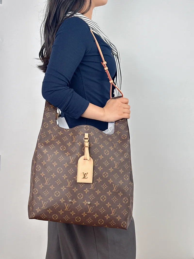 Louis Vuitton Top Handle Bag ATLANTIS Monogram PVC Large 34 × 13.5 × 34 cm — on-model view 2 of 2
