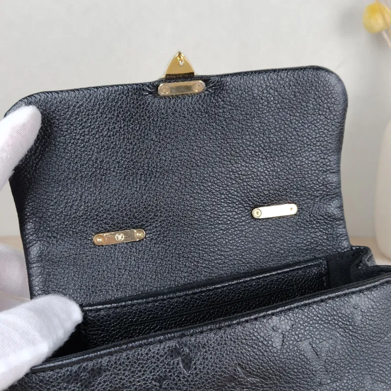 Louis Vuitton Crossbody Bag MADELEINE Black Monogram Empreinte Embossed Calfskin nano 21 × 6 × 12.5 cm — detail view 4 of 11