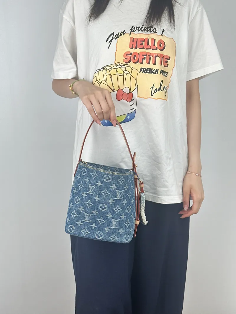 Louis Vuitton Top Handle Bag ALL IN BB Blue BB16 × 12 × 18 cm — on-model view 2 of 2