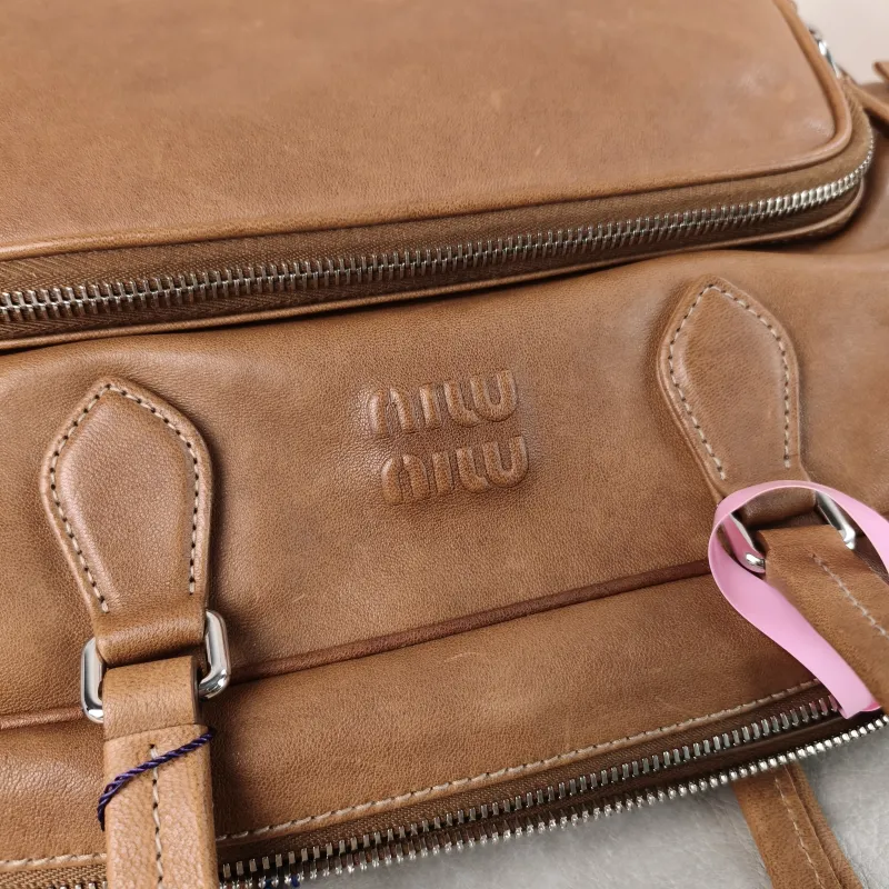 Miumiu Top Handle Bag Pocket Top Handle Bag Caramel SL ambskin One Size 32 × 14 × 22 cm — detail view 10 of 13