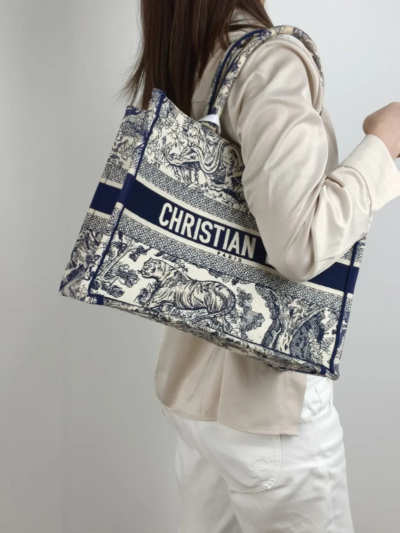 DIOR Top Handle Bag Book Tote Collection · White Blue Canvas Medium 36 × 16.5 × 27.5 cm — on-model view 2 of 2