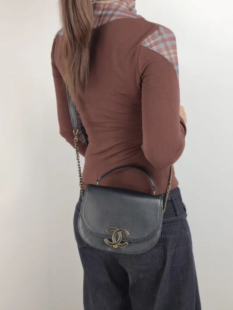 Chanel Crossbody Bag Collection Top Handle Crossbody Bag Black Calfskin One Size 20.5 × 6.5 × 16 cm 23 — on-model view 1 of 3