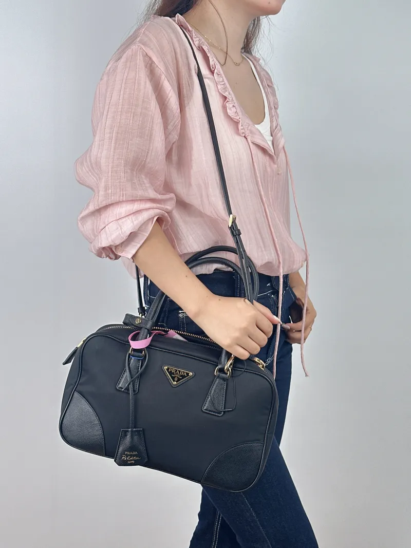 PRADA Top Handle Bag Black Nylon One Size 31 × 9 × 18 cm — on-model view 2 of 2