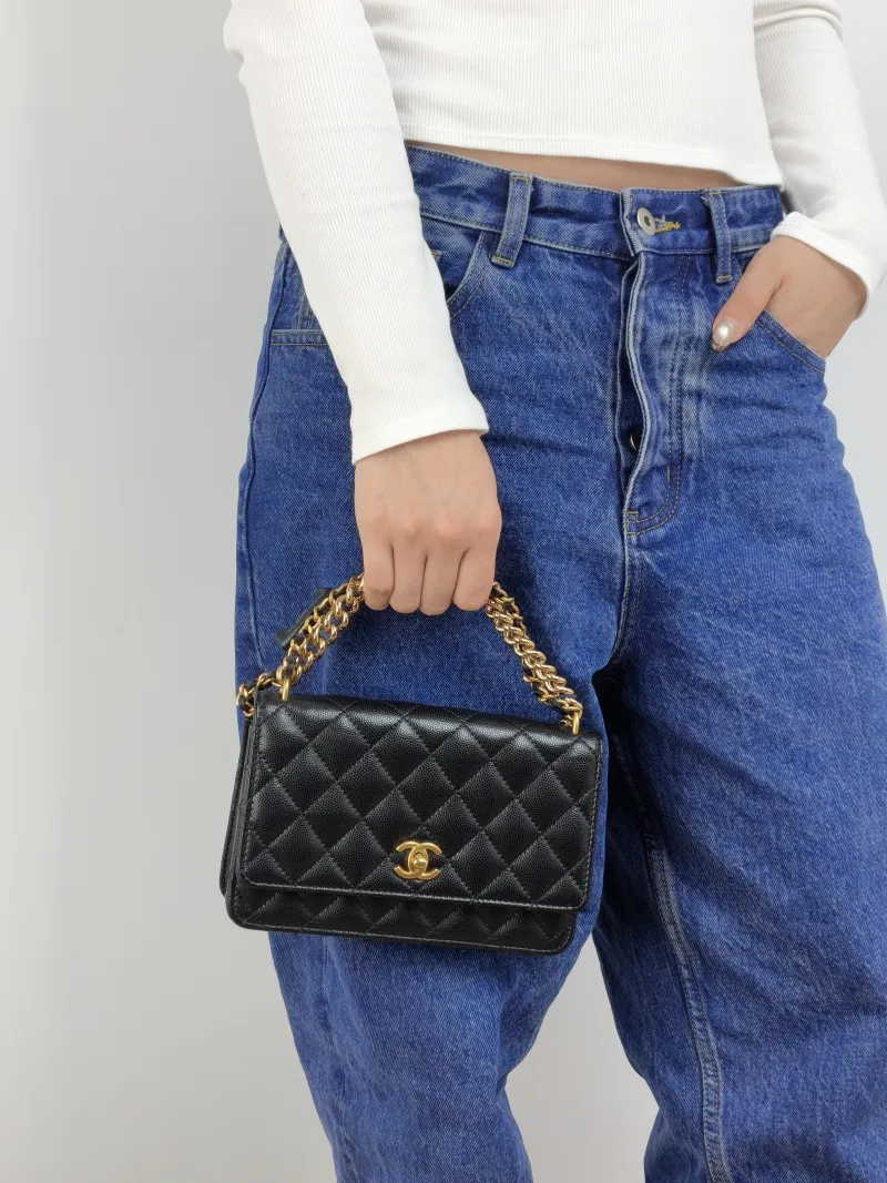 Chanel Crossbody Bag 24s woc Black Grained Calfskin Mini 19.2 × 3.5 × 12.3 cm — on-model view 1 of 3