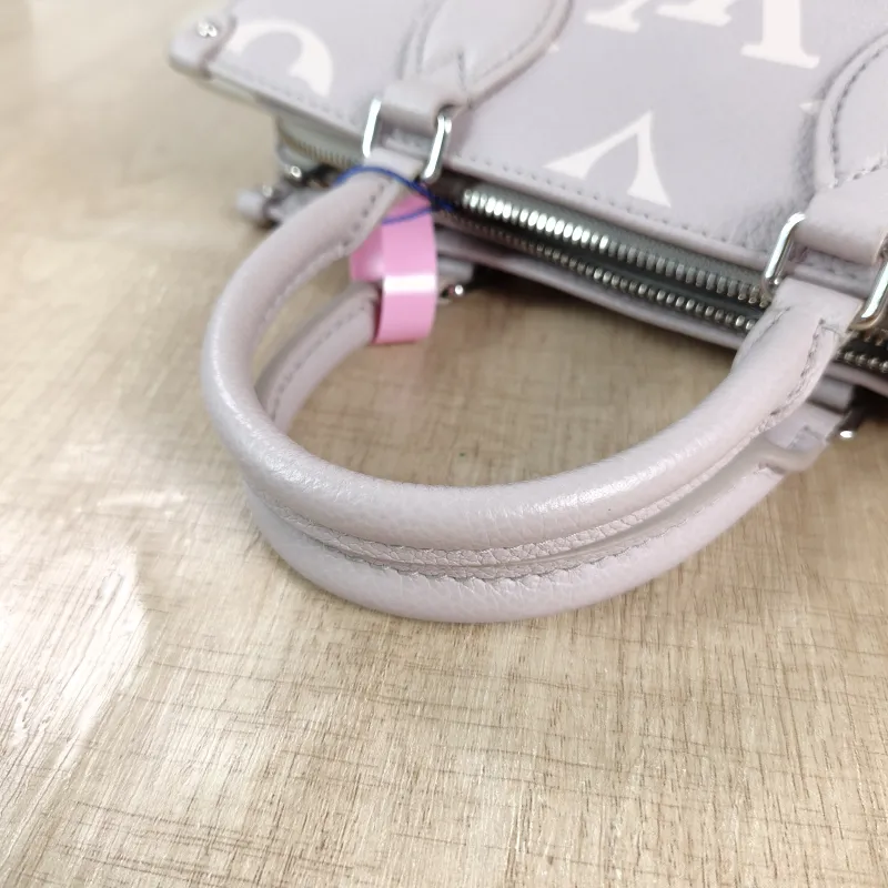 Louis Vuitton Crossbody Bag Onthego East West Two Straps Grey Monogram Empreinte Embossed Calfskin Small 25 × 10 × 13 cm — detail view 12 of 12