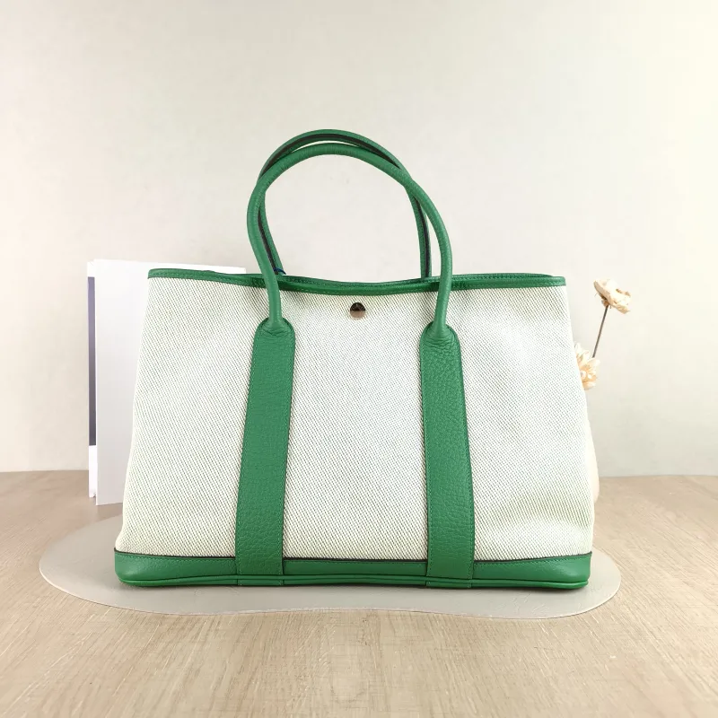 Hermès Top Handle Bag Garden Party 36 36 Beige Canvas · Calfskin Large 36 × 17 × 26 cm R — cover view 5 of 5