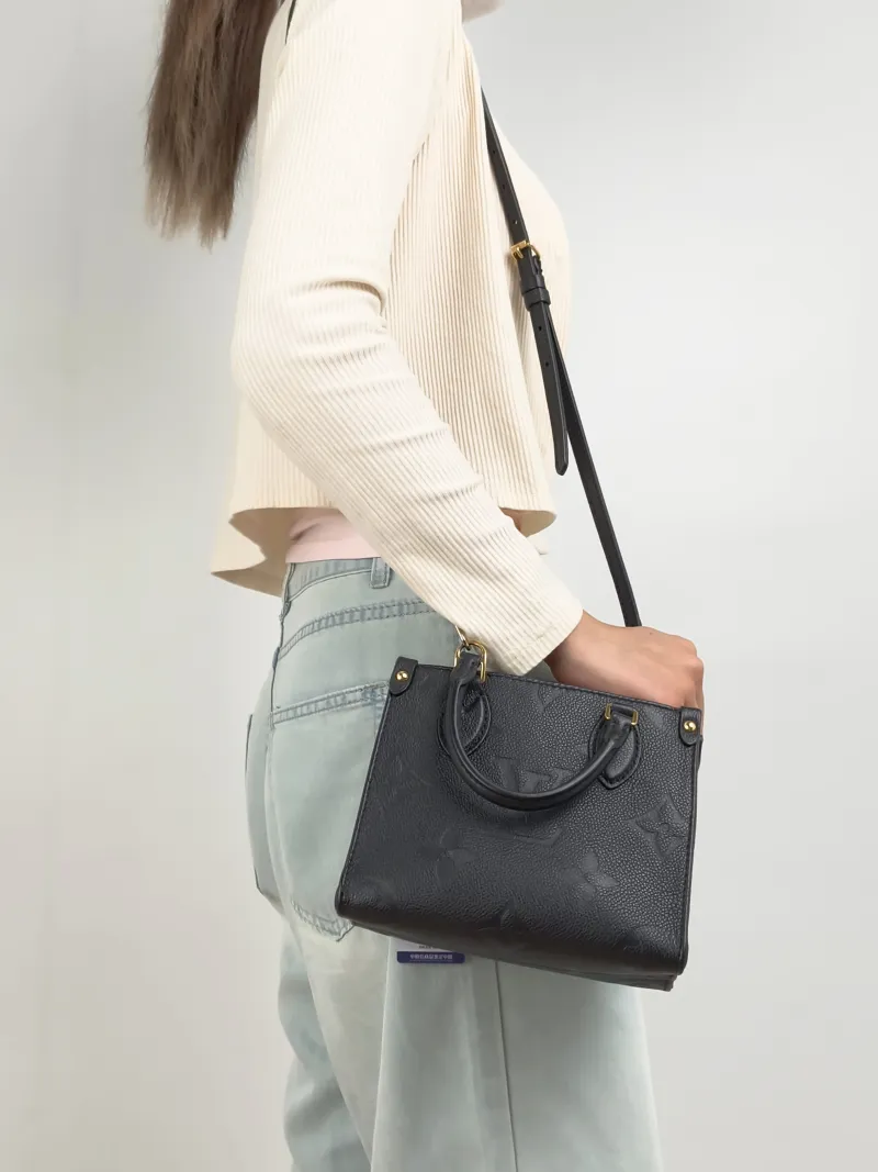 Louis Vuitton Crossbody Bag Onthego BB Black Empreinte Embossed Calfskin Monogram BB18 × 8.5 × 15 cm — on-model view 1 of 3