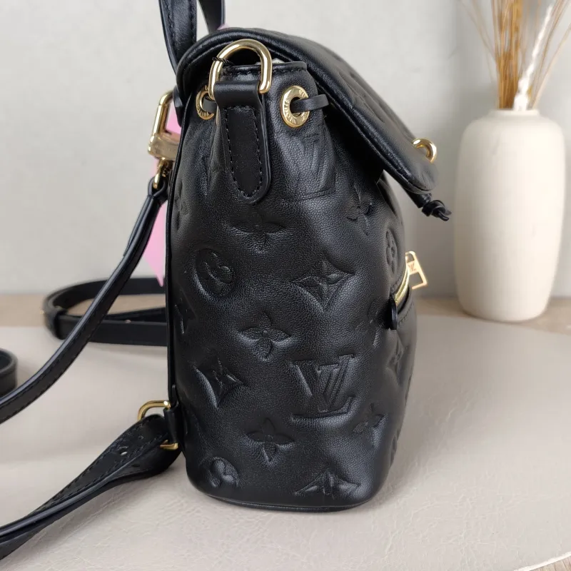 Louis Vuitton Backpack Coussin Backpack Black with Gold-Tone Hardware Lambskin Mini 15 × 7.5 × 20 cm — detail view 9 of 14