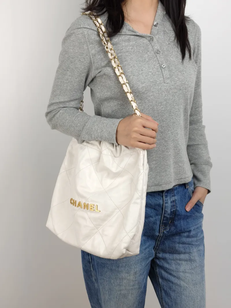 Chanel Shoulder Bag 22Bag White CC alfskin Small 35 × 7 × 37 cm — on-model view 1 of 2