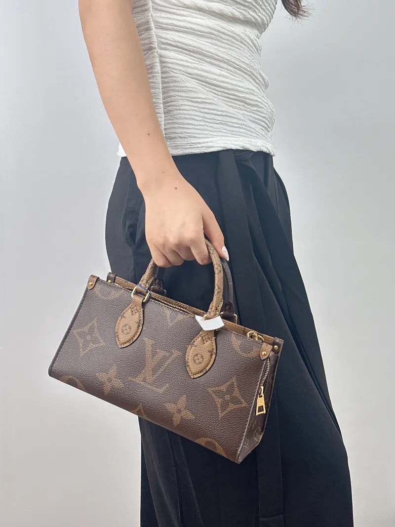 Louis Vuitton Crossbody Bag Onthego East West Two Straps Monogram PVC Small 25 × 10 × 13 cm — on-model view 2 of 2