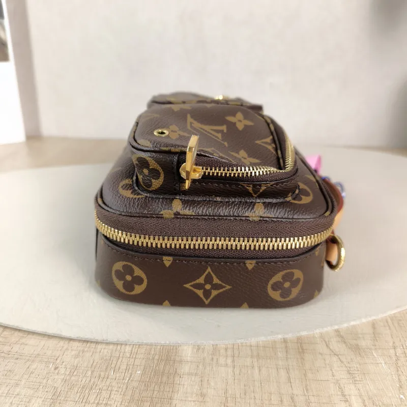 Louis Vuitton Crossbody Bag Utility Crossbody Camera Bag Monogram PVC One Size 18 × 10 × 11 cm — detail view 1 of 11