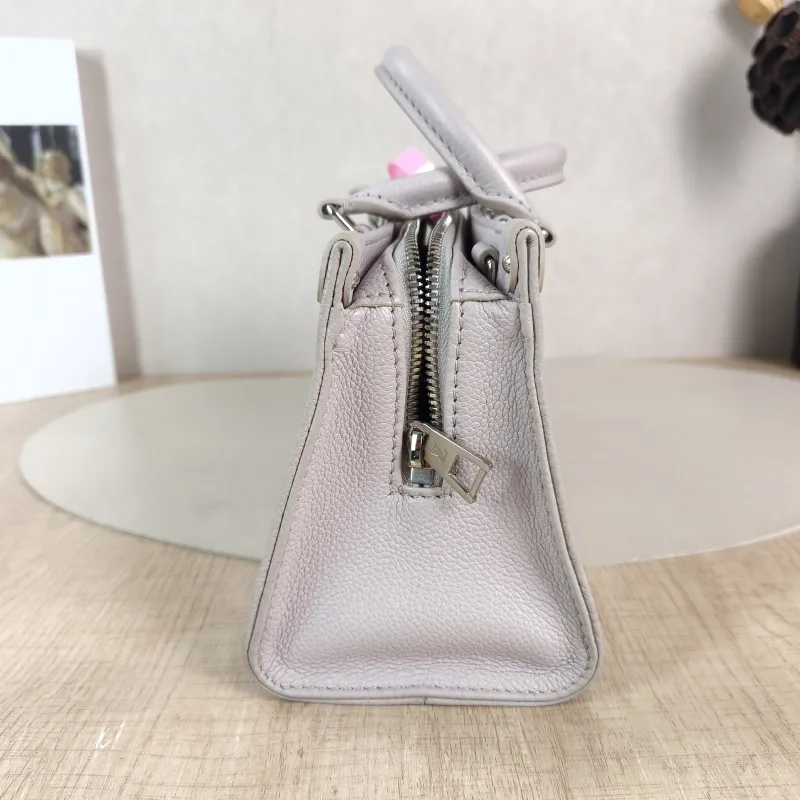 Louis Vuitton Crossbody Bag Onthego East West Two Straps Grey Monogram Empreinte Embossed Calfskin Small 25 × 10 × 13 cm — detail view 11 of 12