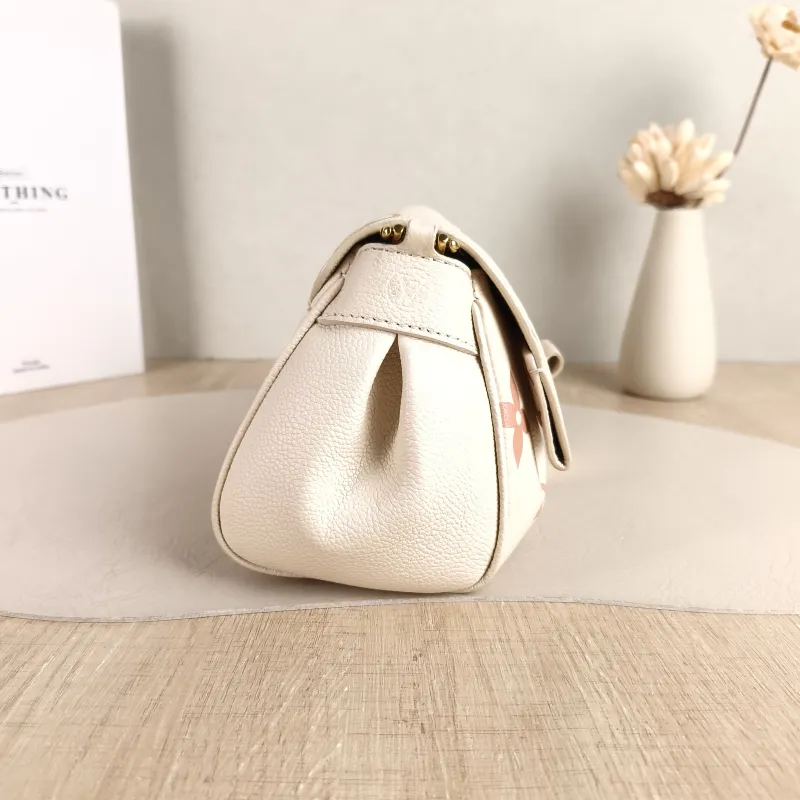 Louis Vuitton Crossbody Bag Favorite White · Pink Empreinte Embossed Calfskin Medium 24 × 9 × 14 cm — detail view 1 of 11