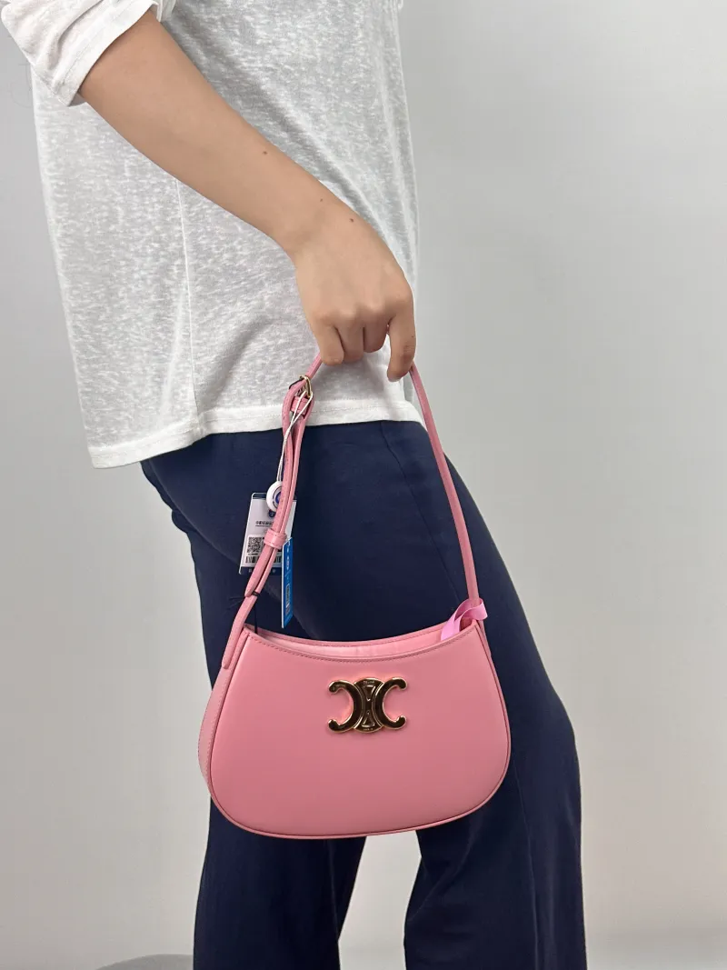CELINE Shoulder Bag tilly Pink Calfskin Medium 22 × 4 × 13.5 cm — on-model view 1 of 2