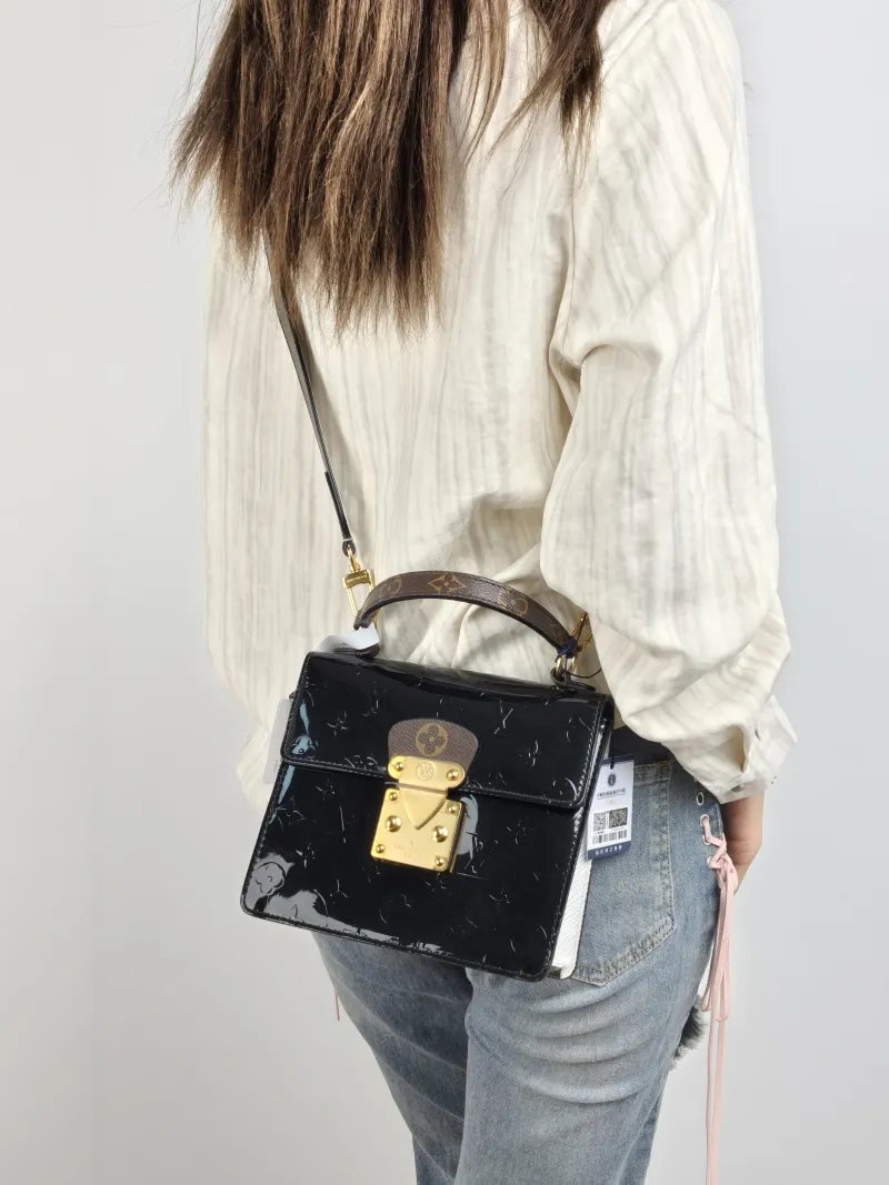 Louis Vuitton Crossbody Bag Spring Street Black Patent Leather · PVC One Size 17 × 8.5 × 16 cm Leather Tag — on-model view 2 of 2