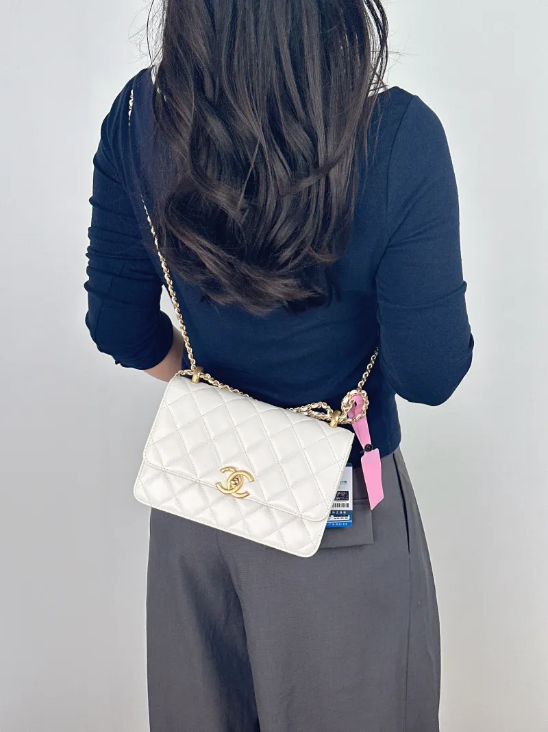 Chanel Crossbody Bag White Calfskin Medium 22 × 8 × 14.5 cm — on-model view 2 of 2