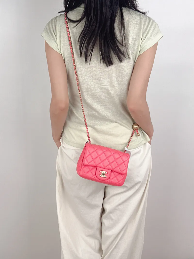 Chanel Crossbody Bag Pink Lambskinmini17 × 8 × 13.5 cm — on-model view 1 of 3