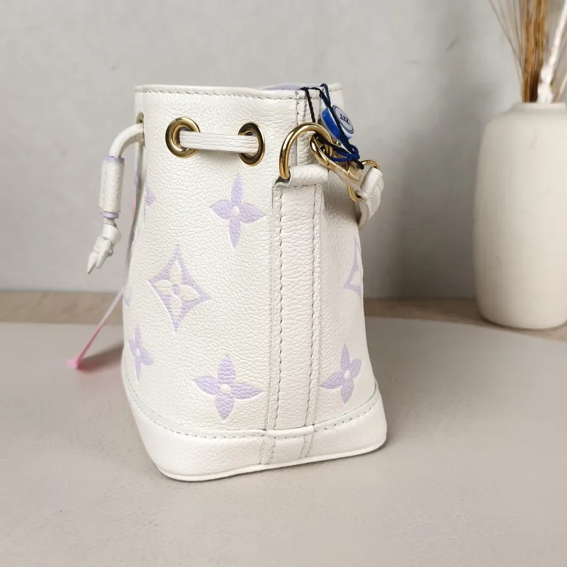 Louis Vuitton Crossbody Bag NANO NOÉ Bucket Bag Nano White · Monogram Empreinte Embossed Calfskin nano 13 × 10 × 16 cm — detail view 7 of 9