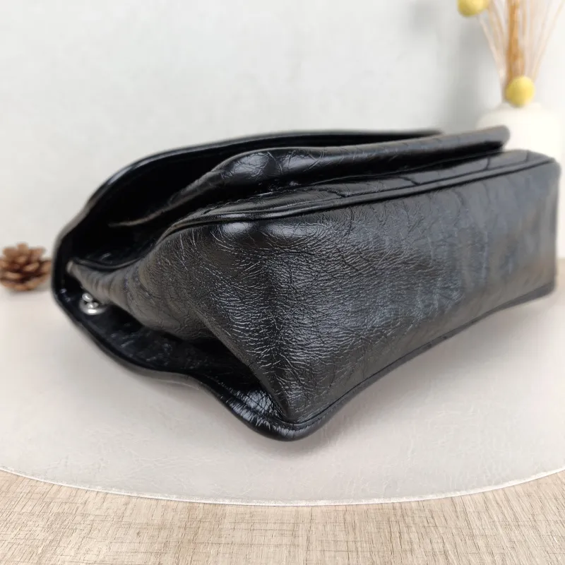 SAINT LAURENT Crossbody Bag Niki D Waxed Leather Calfskin Medium 28 × 8.5 × 20 cm — detail view 4 of 13