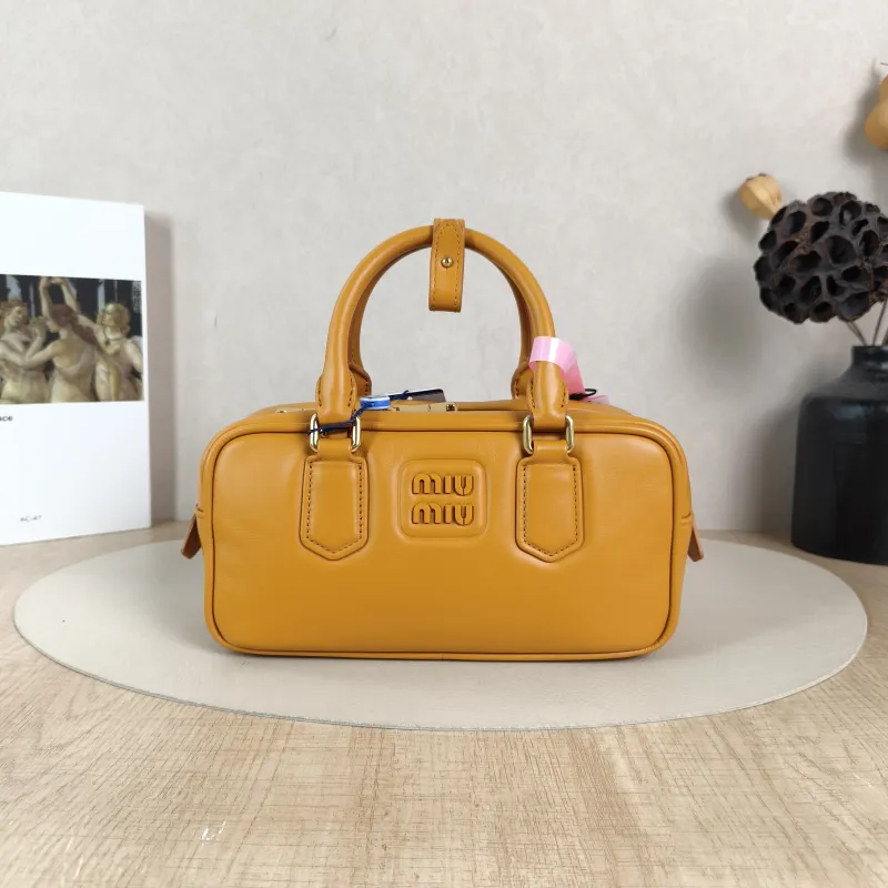 Miumiu Top Handle Bag Arcadie Collection Bowling Bag Yellow Calfskin Medium22 × 7.5 × 10.5 cm