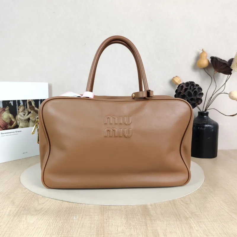Miumiu Top Handle Bag Beau CC alfskin Large 34 × 10 × 23 cm