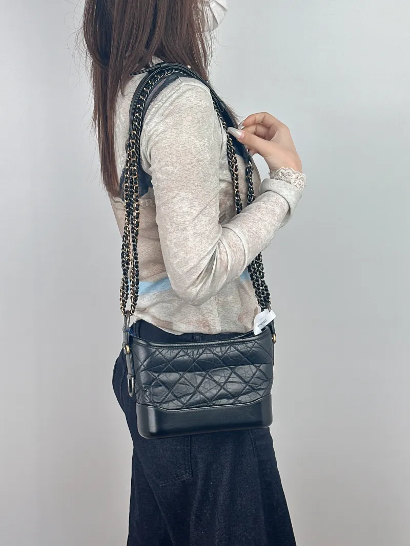 Chanel Crossbody Bag Gabrielle Gabrielle Bag Black CC alfskin Small20 × 8 × 15 cm — on-model view 2 of 2