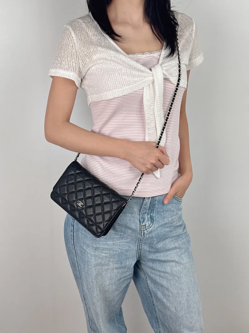 Chanel Crossbody Bag Classic Flap WOC CF WOCWOC Bag Black Grained Calfskin Mini 19.2 × 3.5 × 12.3 cm — on-model view 1 of 2
