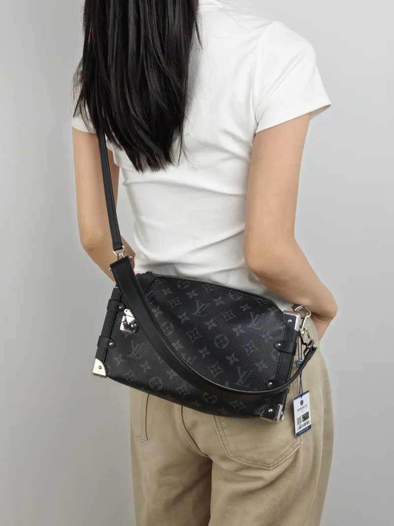 Louis Vuitton Crossbody Bag Side Trunk East West Box Monogram PVC Medium 28 × 7 × 15 cm — on-model view 1 of 2