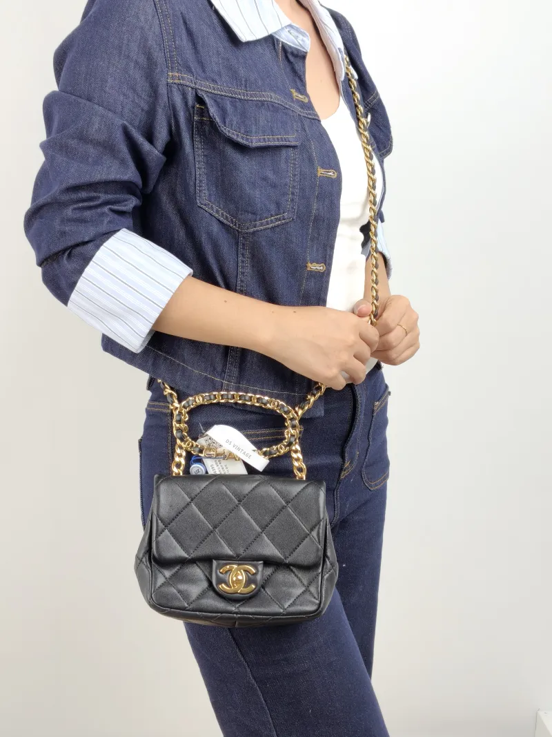 Chanel Top Handle Bag Black Lambskin Mini 17 × 6 × 13 cm — on-model view 1 of 2