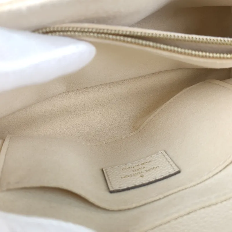 Louis Vuitton Crossbody Bag MADELEINE White Monogram Empreinte Embossed Calfskin BB 24 × 8.5 × 17 cm — detail view 14 of 14
