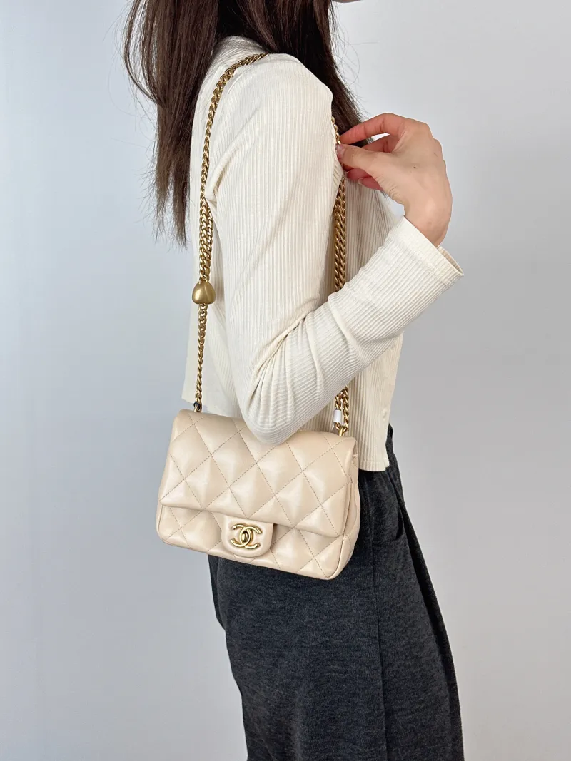 Chanel Crossbody Bag Beige Lambskin One Size18 × 6 × 14 cm — on-model view 1 of 2