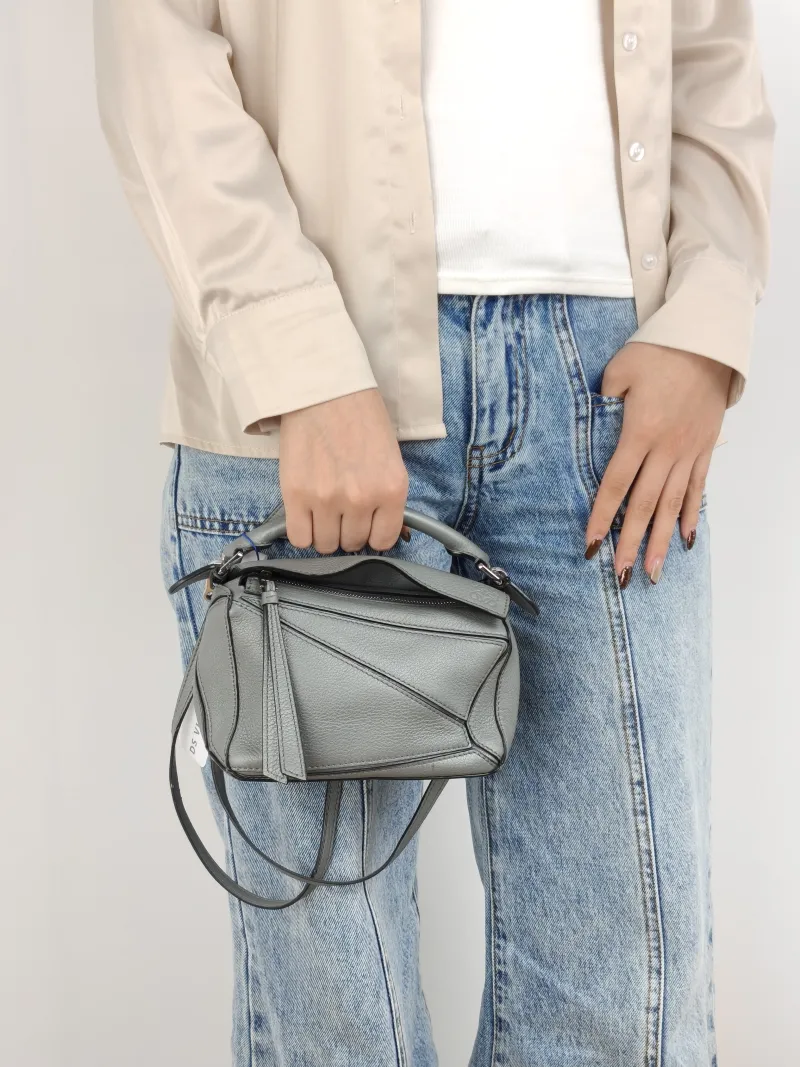 LOEWE Crossbody Bag Puzzle Grey Calfskin Mini 18 × 8 × 12.5 cm — on-model view 2 of 2