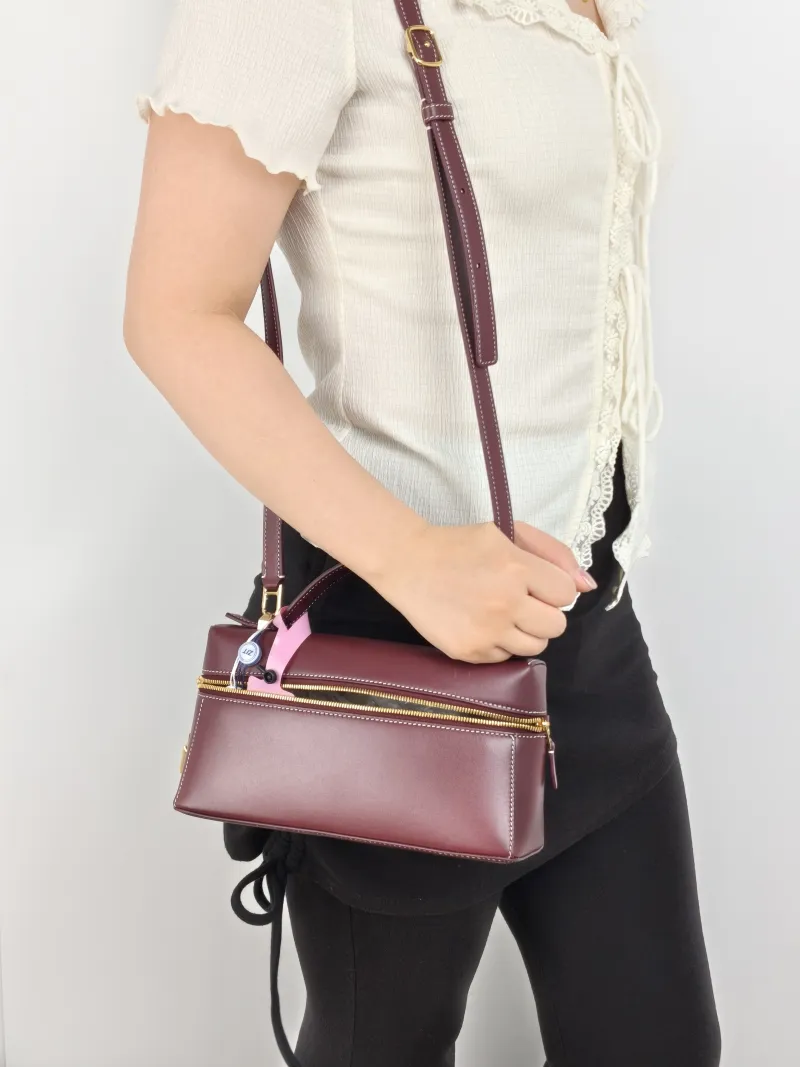 Loro Piana Crossbody Bag Extra Bag L23 Burgundy Calfskin One Size 23 × 7 × 12 cm — on-model view 2 of 3