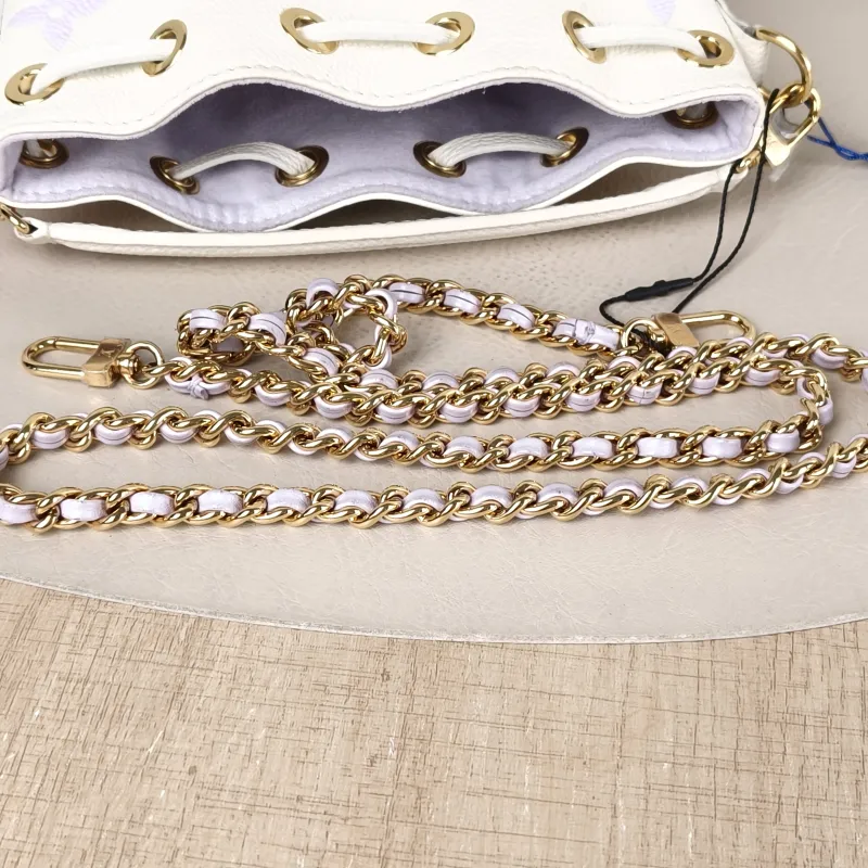 Louis Vuitton Crossbody Bag NANO NOÉ Bucket Bag Nano White · Monogram Empreinte Embossed Calfskin nano 13 × 10 × 16 cm — detail view 9 of 9