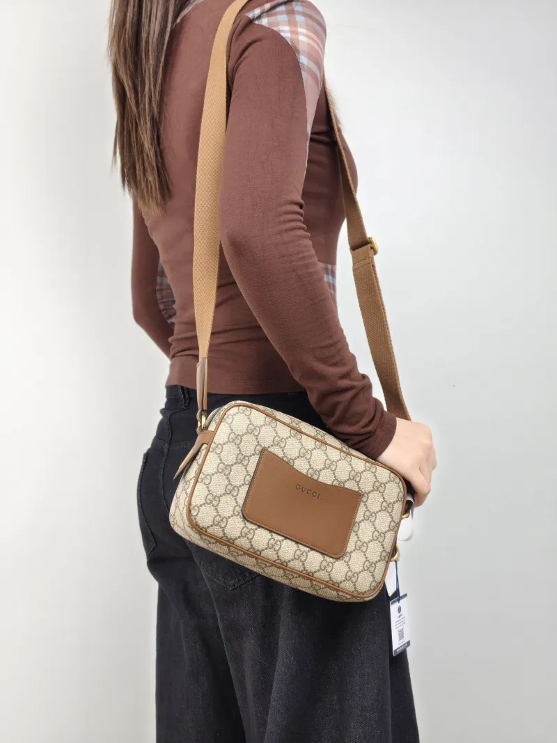 GUCCI Crossbody Bag Camera Bag Brown PVC Small 22.5 × 5.5 × 14 cm — on-model view 1 of 2