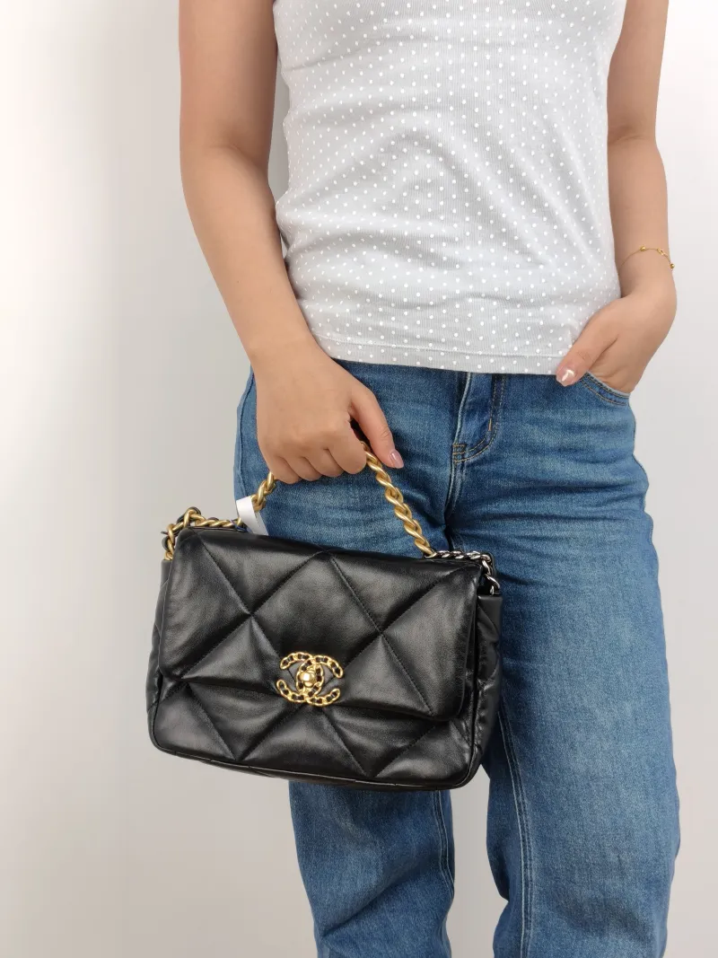Chanel Crossbody Bag 19Bag Black Waxed Leather Small 26 × 9 × 16 cm 30 — on-model view 3 of 3