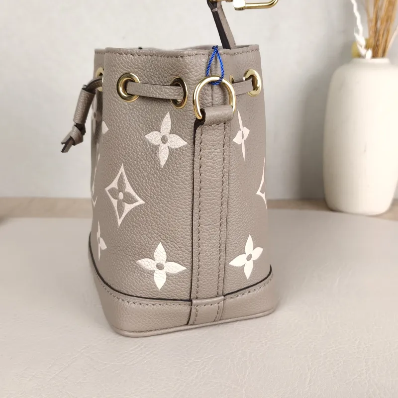 Louis Vuitton Crossbody Bag NANO NOÉ Bucket Bag Nano · White Monogram Empreinte Embossed Calfskin nano 13 × 10 × 16 cm — detail view 11 of 11
