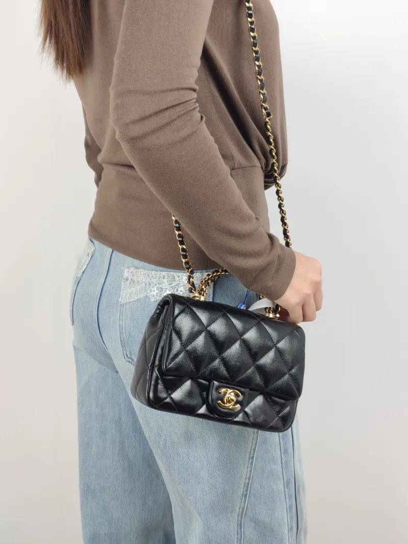 Chanel Crossbody Bag 24b Black Waxed Leather One Size 19 × 6 × 13 cm — on-model view 1 of 3