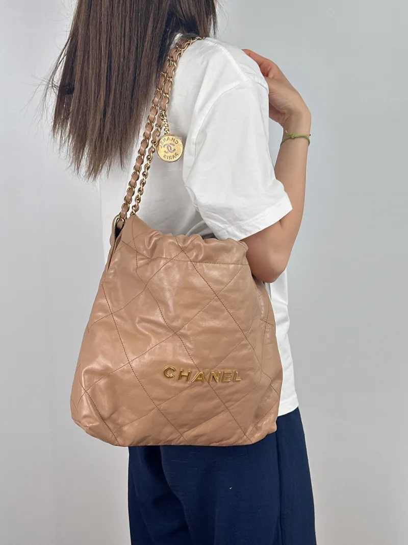 Chanel Shoulder Bag22Bag Taupe Calfskin Small35 × 7 × 37 cm — on-model view 1 of 2