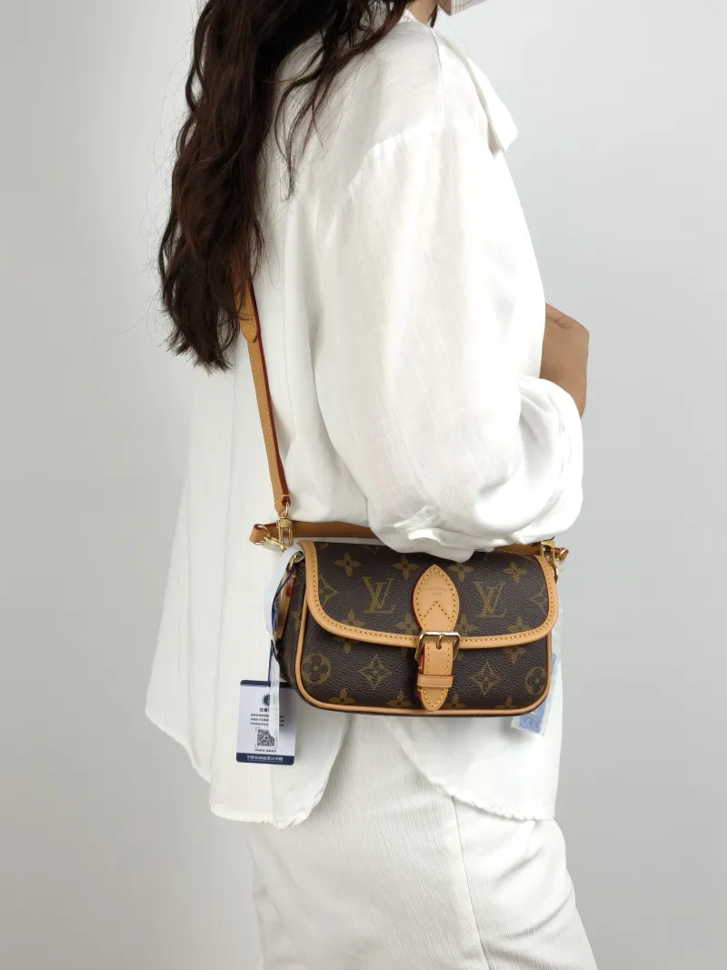 Louis Vuitton Crossbody Bag Diane Baguette Bag Monogram PVC nano 19 × 6 × 10.5 cm — on-model view 2 of 2