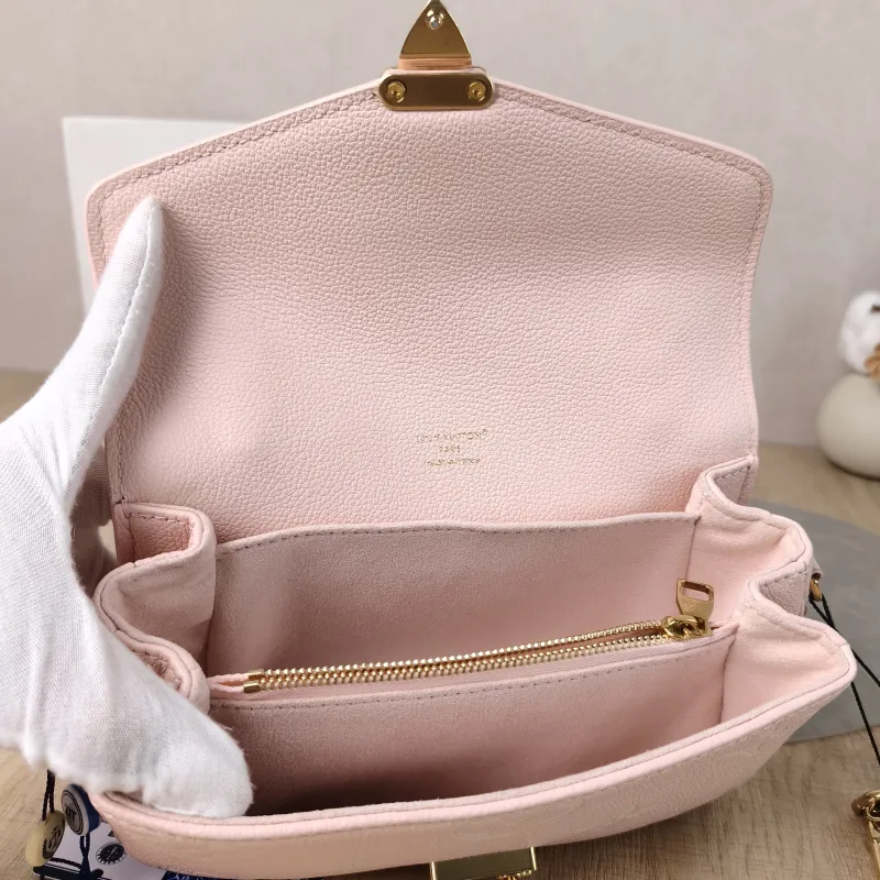 Louis Vuitton Crossbody Bag Pochette Métis East West Monogram Empreinte Embossed Calfskin Small 21.5 × 6 × 13.5 cm — detail view 6 of 14